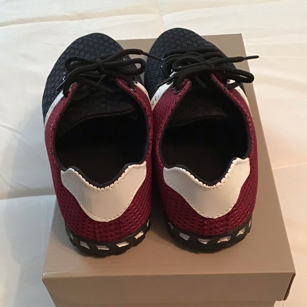 New shoes in red, white and black. Very comfortable and light weight.